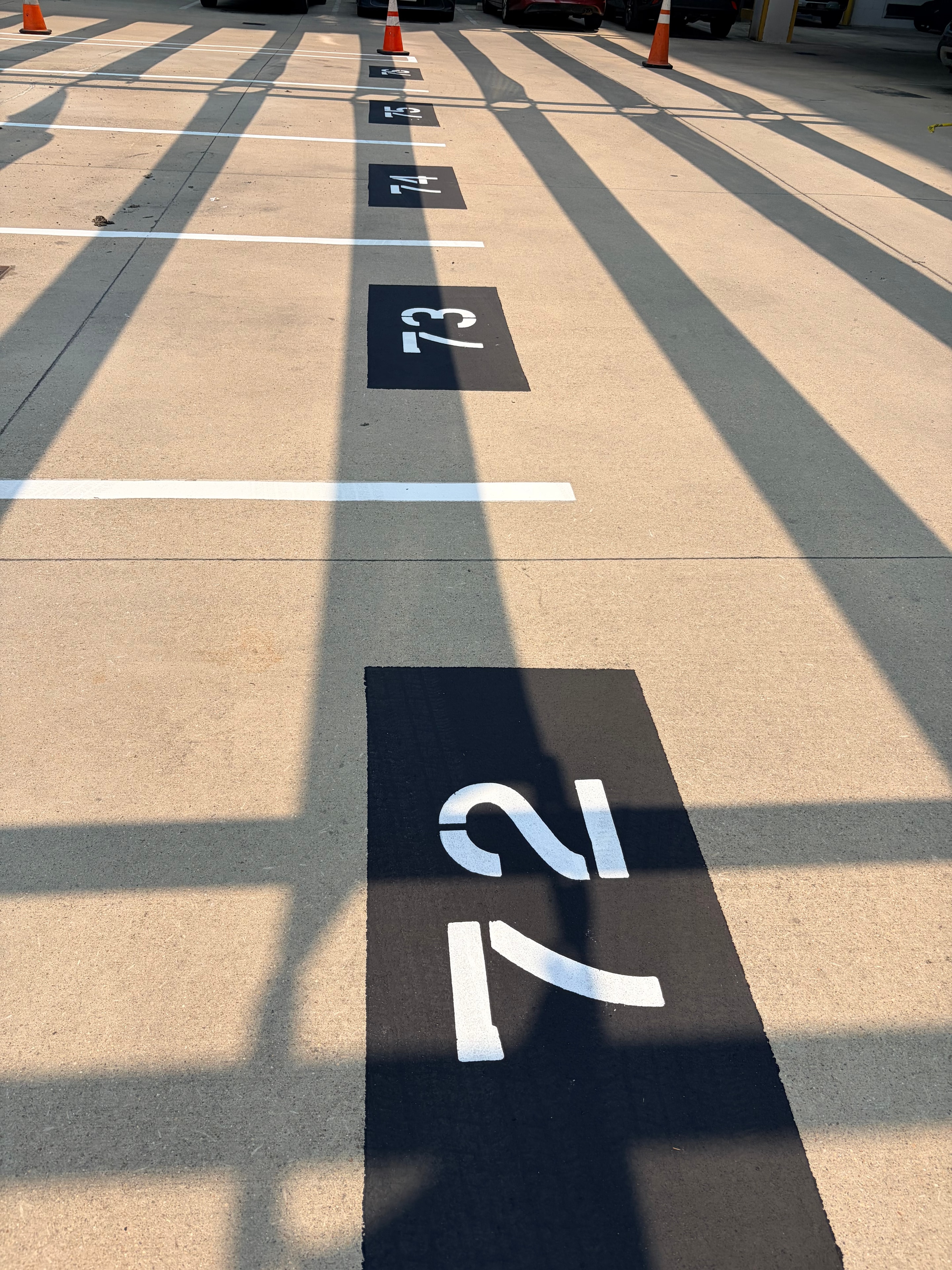 Freshly painted parking garage space numbers